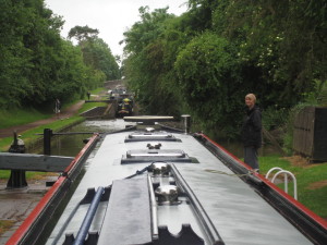 A drizzly start up the Audlem flight. Check out the matching boat and brolly in the boat ahead! 